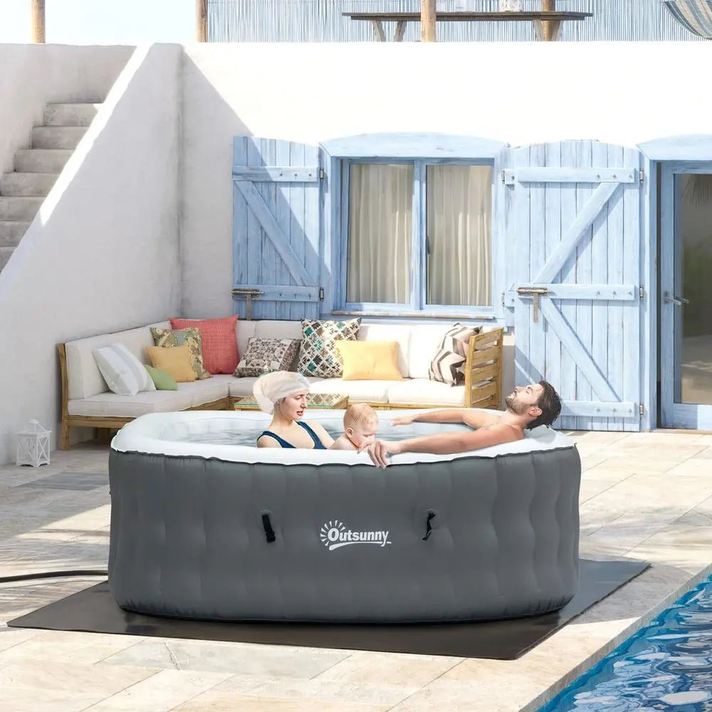 Woman Relaxing In An Inflatable Hot Tub Spa For 4-6 Persons, Square And Grey