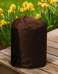 Insulated Pump Cover For Egg Pump: a Brown Bag Sits On a Wooden Bench