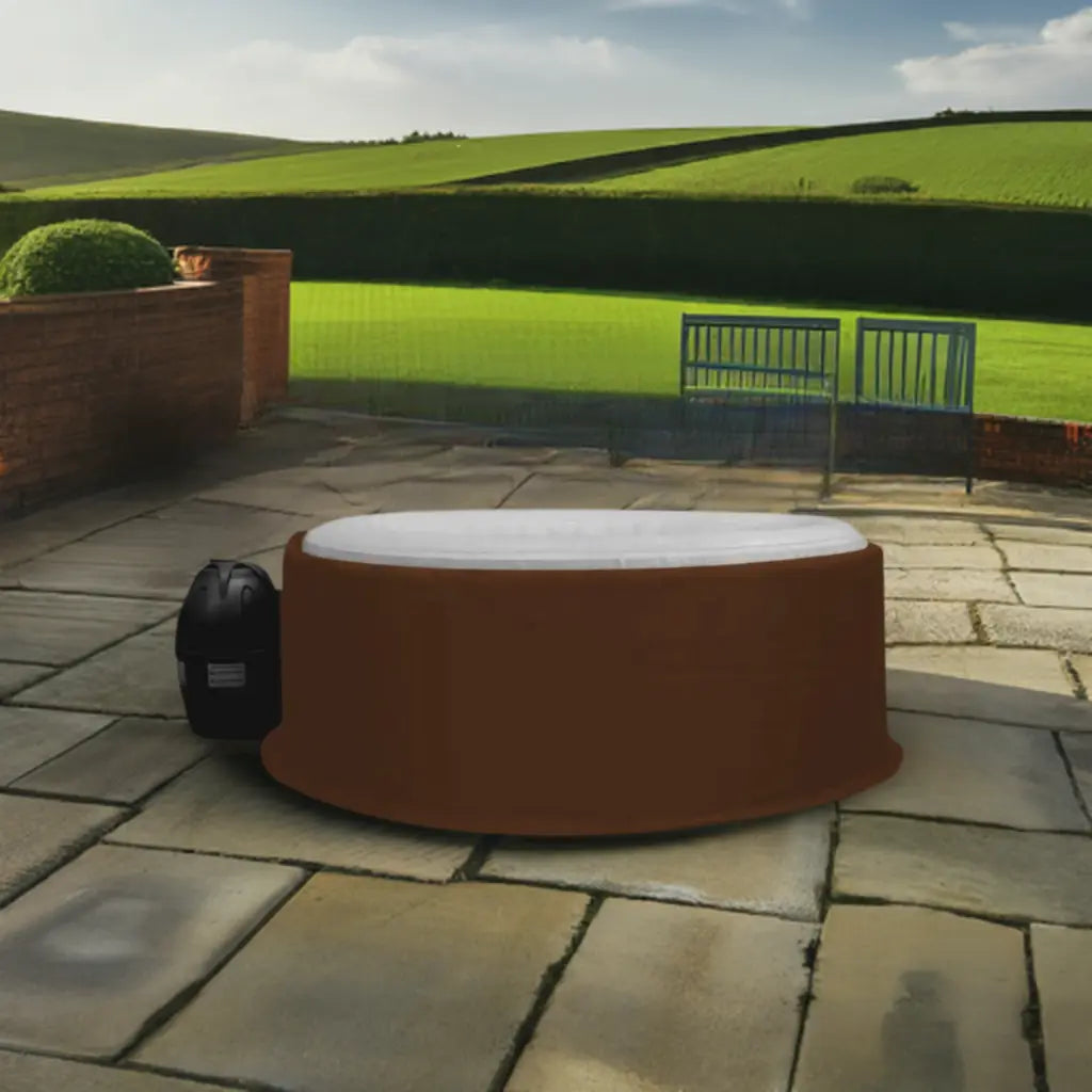 Circular Brown Hot Tub On Stone Patio With Wave Spa Insulated Jacket For Wave Spa Atlantic