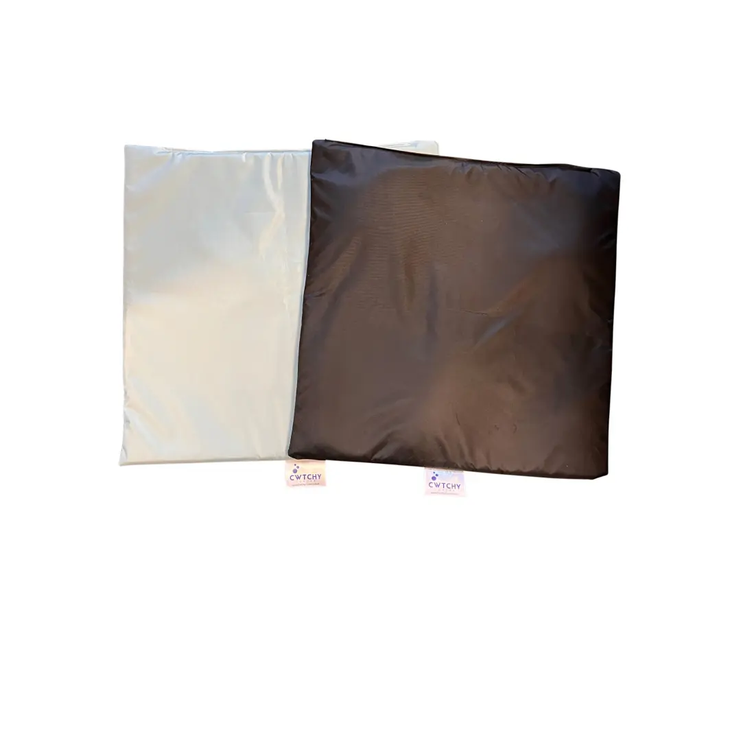 A White And Brown Pillow Paired With The Under Pump Base For Enhanced Comfort Under Your Pump