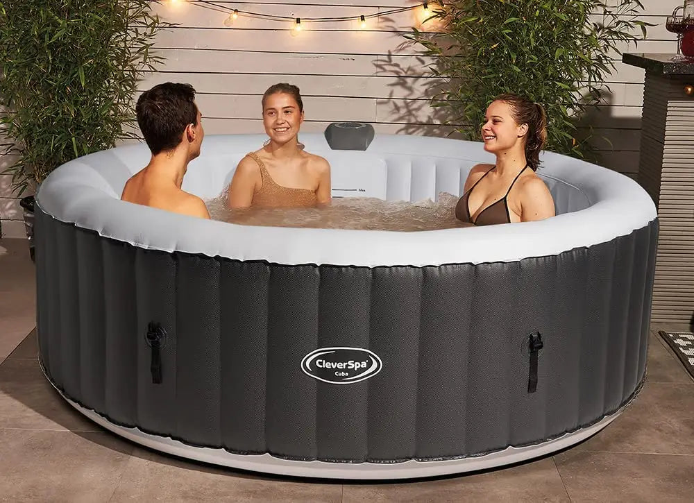 A Couple Enjoying a Cleverspa Hot Tub, Featured In a Comprehensive Review Of Inflatable Hot Tubs.