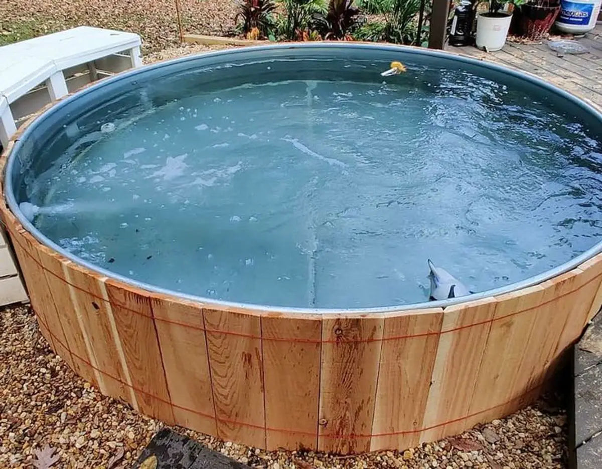 A Wooden Barrel With Water, Enhancing The Relaxing Atmosphere Of Your Hot Tub Experience.