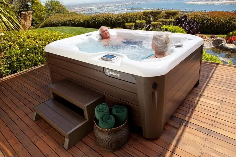 Woman Enjoying Hot Tub On Deck With Proper Insulation.