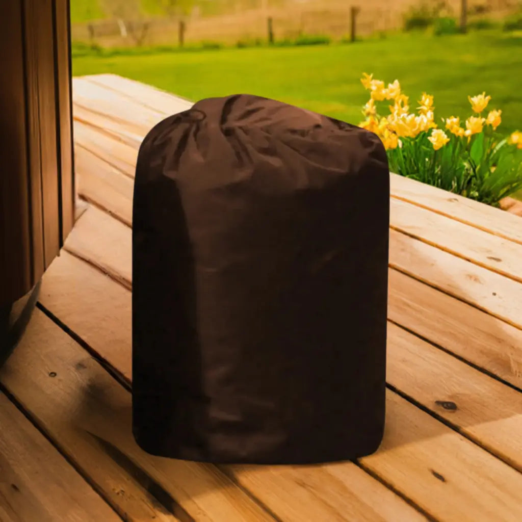 A Black Insulated Pump Cover On a Wooden Table For Cosy Spa Smart Pump