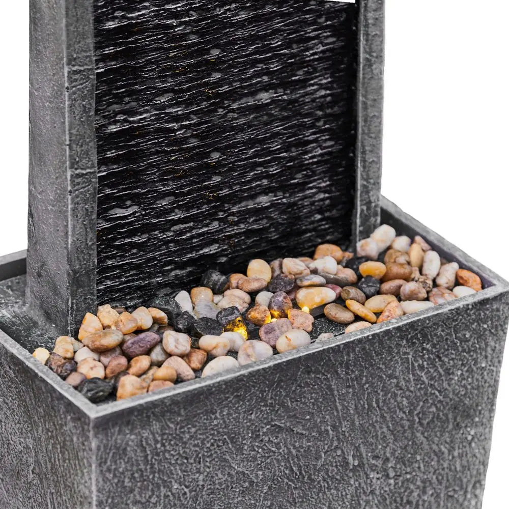 Elegant Hot Tub Fountain With Rocks And Water For a Serene Ambiance