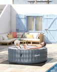 Woman Relaxing In Round Inflatable Hot Tub Bubble Spa For 4-6 People, Grey