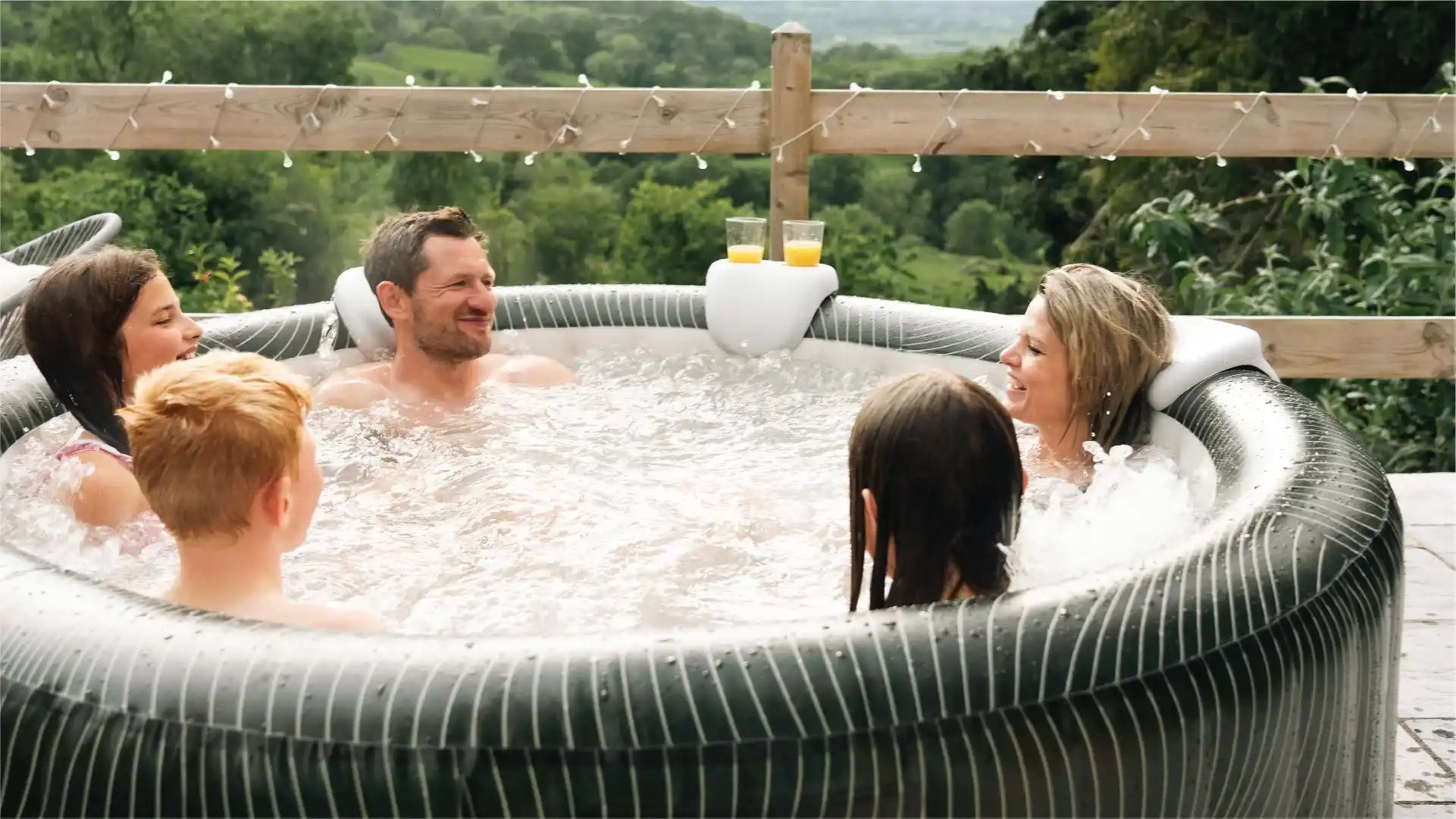 Inflatable hot tub with people.