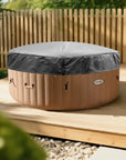 Intex Purespa Hot Tub With Insulated Lid On a Wooden Deck For Energy-efficient Relaxation