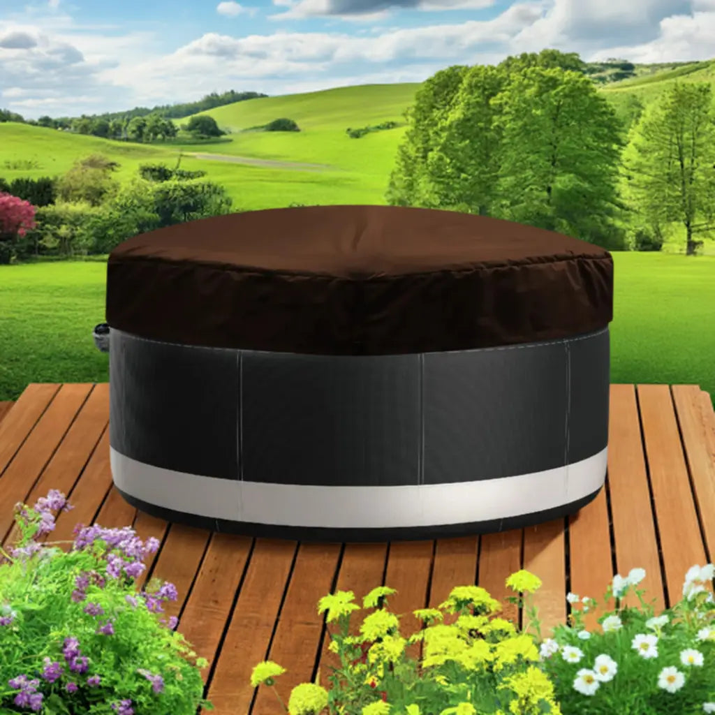 Circular Hot Tub With a Brown Thermal Cover On a Wooden Deck