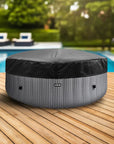 Round Patio Chair On Wooden Deck Beside Wave Spa Atlantic Hot Tub With Insulated Lid