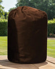 Insulated Pump Cover For Cosy Spa Smart Pump Shown With a Brown Bag On a Yard Table