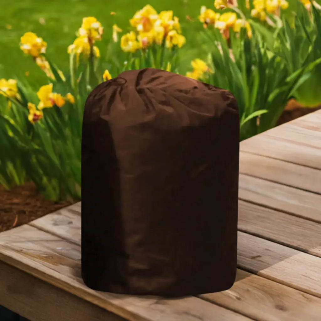 Insulated Pump Cover For Egg Pump: a Brown Bag Sits On a Wooden Bench