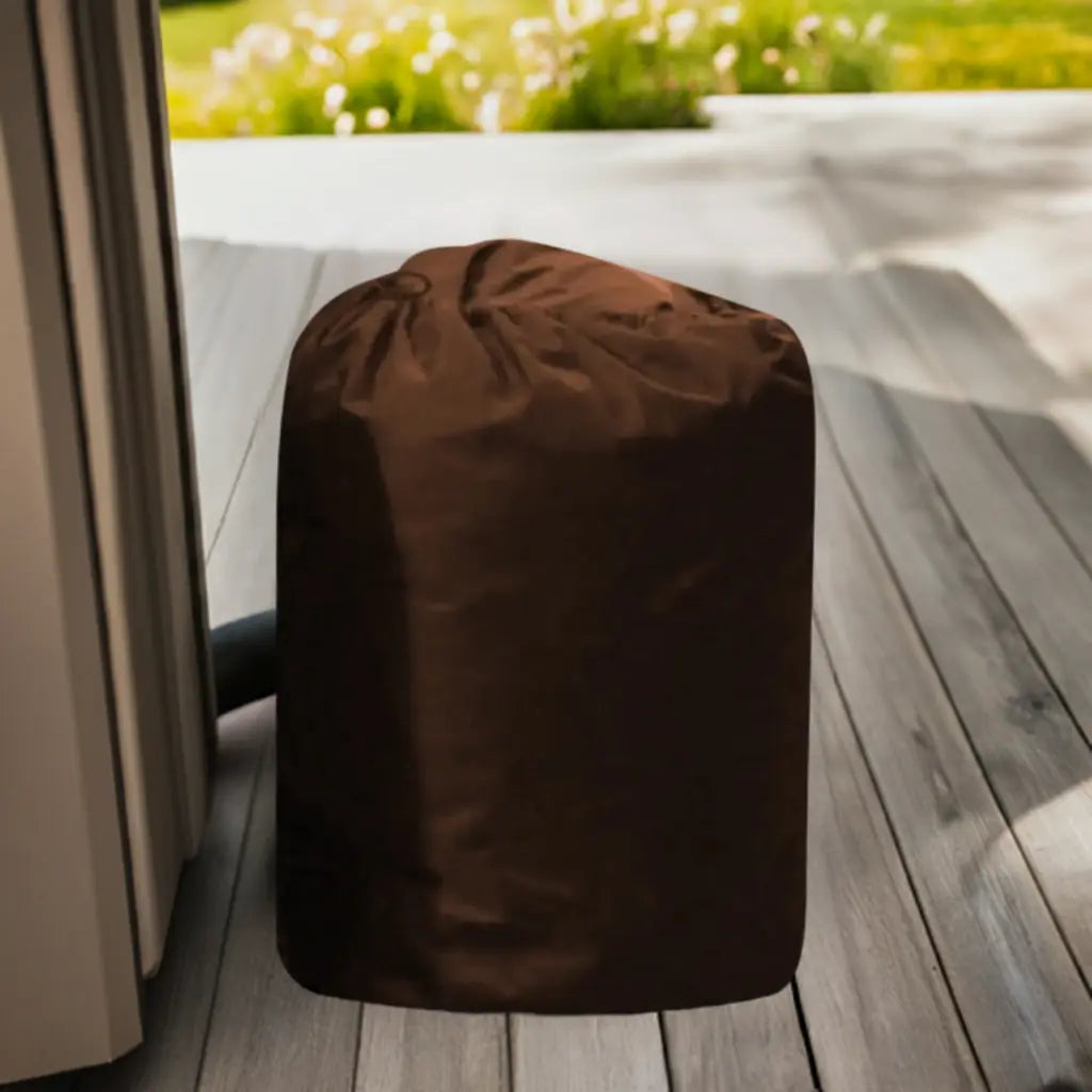 Egg Pump Insulated Cover: a Brown Bean Bag Sitting On a Wooden Deck For Pump Protection