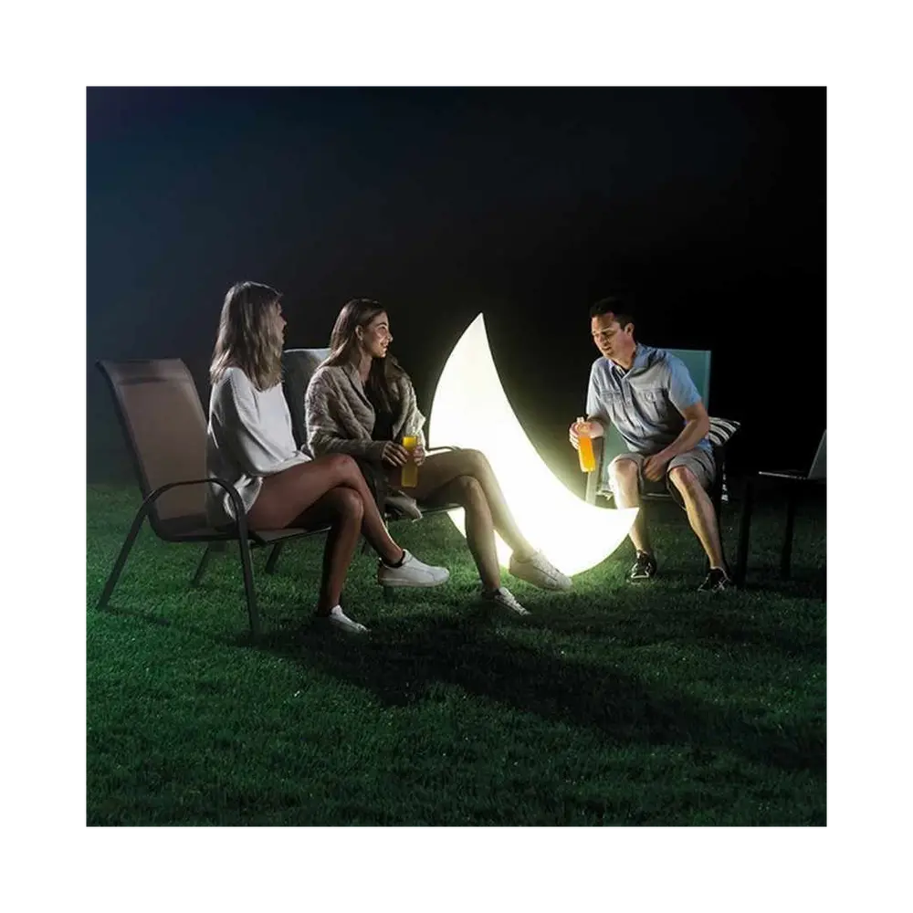 Couple Enjoying The Intex 68693 Led Floating Halfmoon Light, a Perfect Hot Tub Accessory