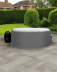 Inflatable Hot Tub With Gray Cover On Paved Patio Using Insulated Hot Tub Jacket For Cleverspa