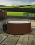 Person Round Hot Tub On a Stone Patio With Insulated Hot Tub Jacket For Cleverspa