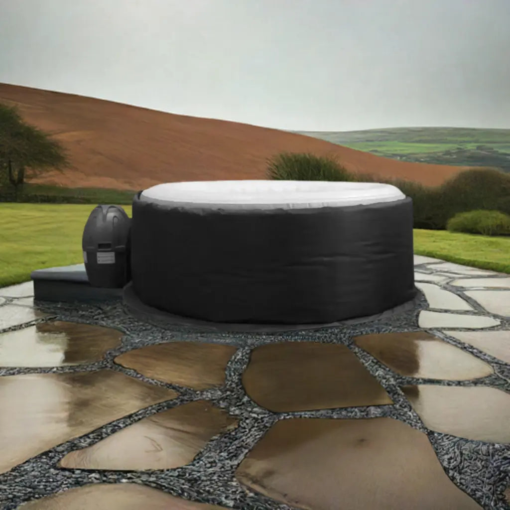 Inflatable Hot Tub With White Top And Black Sides On Stone Patio Using Insulated Jacket For Wave Spa