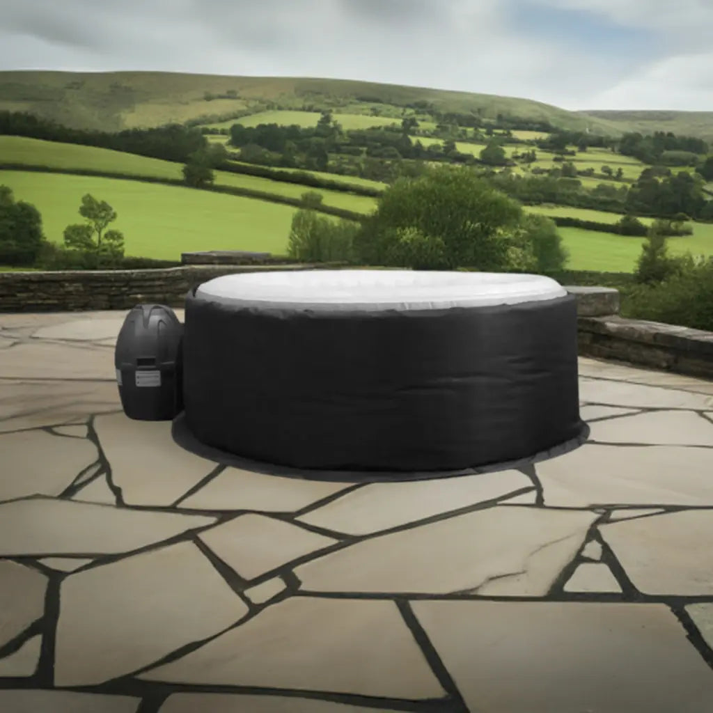 Wave Spa Insulated Hot Tub With Black Cover On Stone Patio, Designed For Wavespa Atlantic