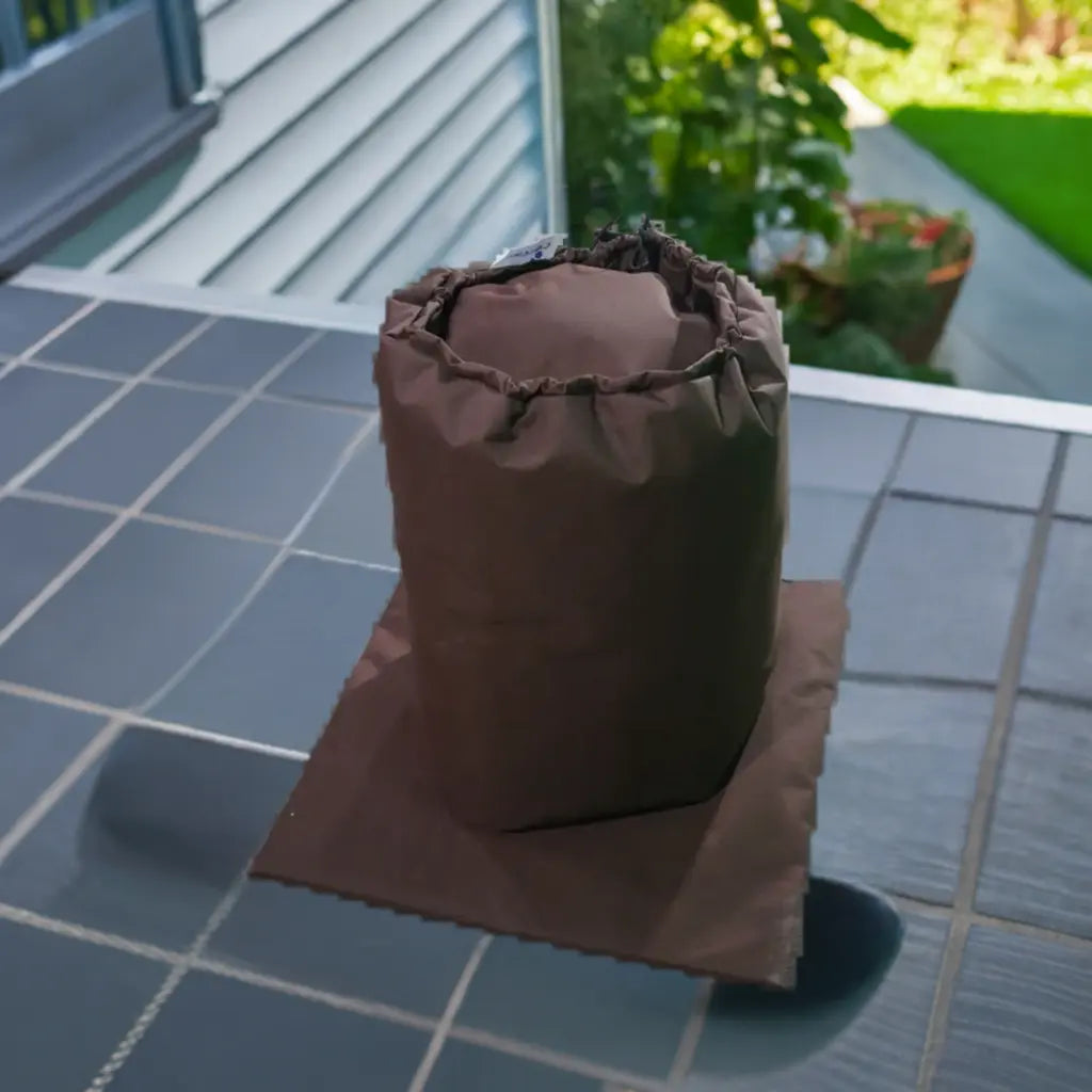 A Bag Of Chocolate On a Table Beside An Insulated Pump Cover For Lay-z Spa Hydrojet 2021