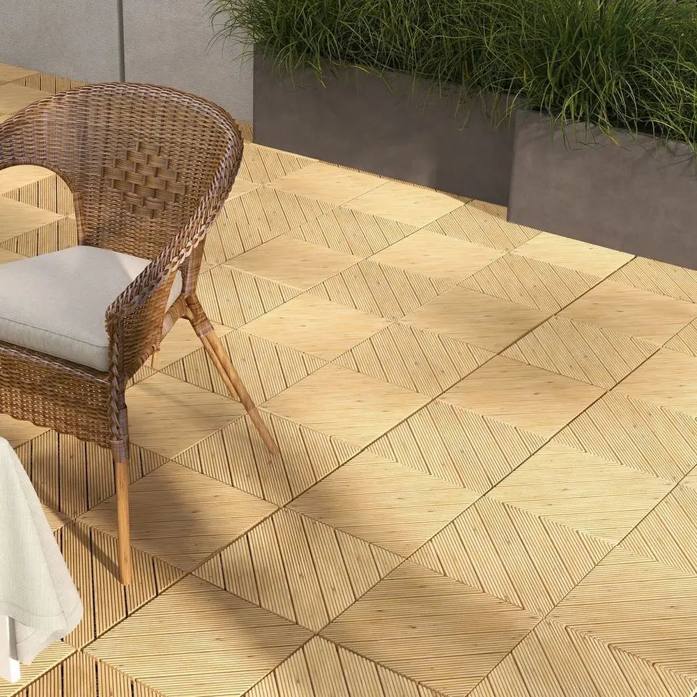 A Patio With a Chair And a Table On Outsunny Interlocking Flooring Tiles, Ideal For Hot Tubs