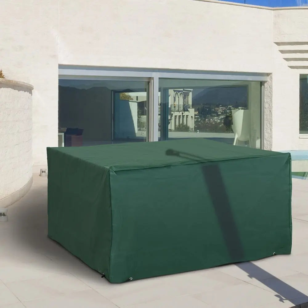 A Large Green Rain Protective Cover For Your Outdoor Rattan Furniture On a Patio