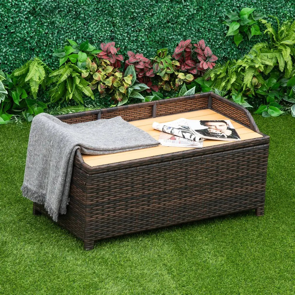 Rattan Hot Tub Storage Bench With Ample Storage And a Cozy Blanket On a Wicker Basket